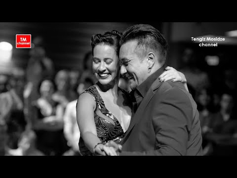  Juana Sepulveda  and  Mariano Frumboli  are  dancing  to  the  tango  "  Caricias  "  by  Francisco Canaro  or  Ángel D'Agostino  in  2015