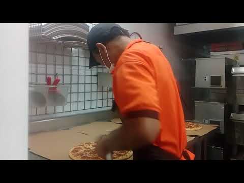 Corte y empacado Little Caesar's Pizza