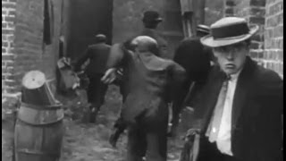 &quot;The Musketeers Of Pig Alley&quot; (1912) director D. W. Griffith, cinematographer Billy Bitzer