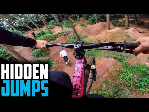 RIDING MTB TRAILS WITH SICK DIRT JUMPS EVERYWHERE!!