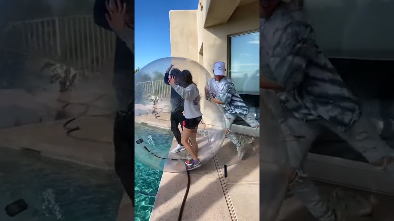 Two People In Giant Bubble