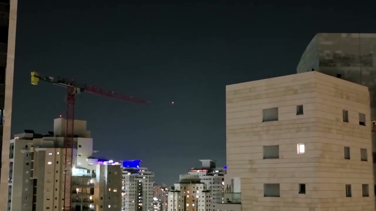 Video | Iranian missiles streak across sky over Israel