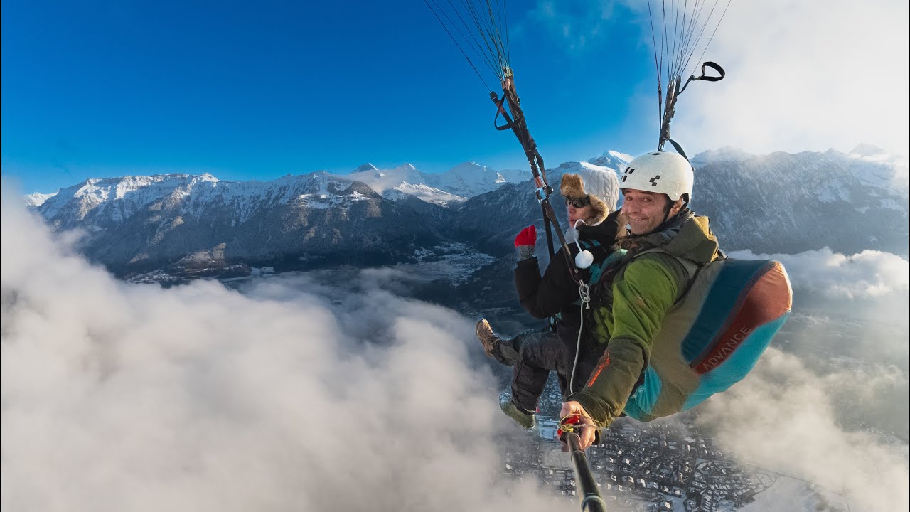 Embark on an exhilarating tandem paragliding adventure in the Swiss Alps.