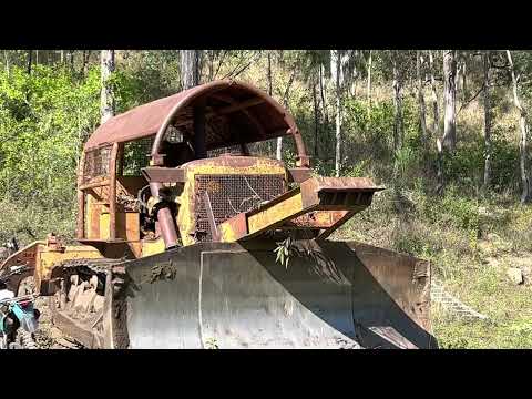 Allis Chalmers dozer pushes dirt