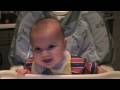 Baby Laughing And Crying In His High Chair