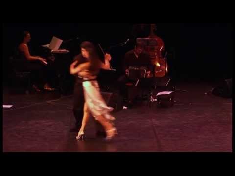  Adrian Veredice  and  Alejandra Hobert  are  dancing  to  a  tango  at  Aix Tango Festival  in  2013