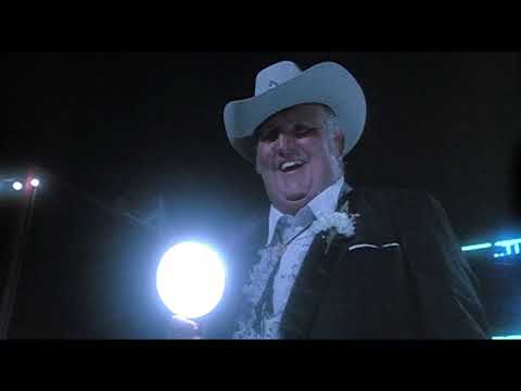 Trailer still — gym and hall chaos intercut with the riverboat; the soundtrack toggles from swagger to sleuth