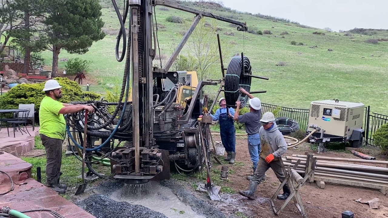 Geothermal Drilling in Golden, CO loading rods and pipe