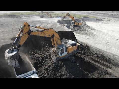 Four Caterpillar 352F, Liebherr 974 And Liebherr 964 Excavators Working On Coal Mines