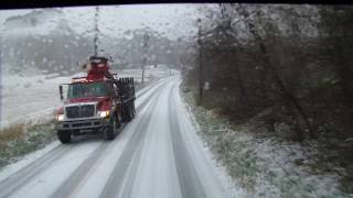 USA truck driving in the snow. Beautiful views of the