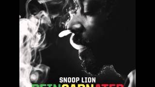 11 Snoop Lion - Torn Apart (feat. Rita Ora)