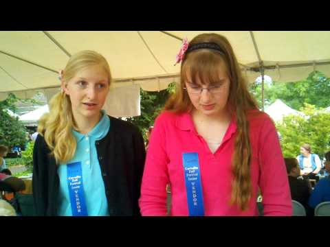 Sisters talk about Fall Festival booth