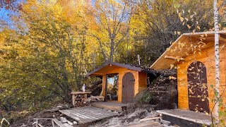 I am building a cozy wooden house in the mountains away from people