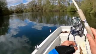 Man fishing Alone on a Lake
