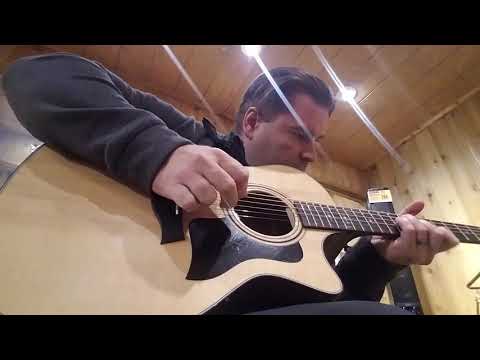 Checking out a Taylor V-Class 314 Grand Auditorium at Guitar Center