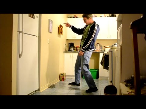 DANCING TO SOME CALYPSO IN THE KITCHEN