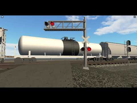 CSX 858 Leads Manifest East | Rd Railroad Crossing