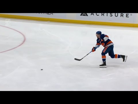Mat Barzal scores a goal against the New York Islanders
