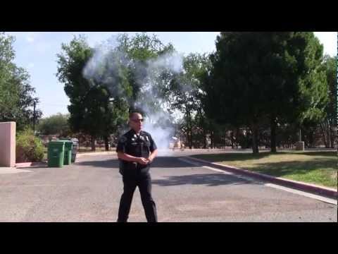 APD SWAT Officer Throws Flash Bang Grenade