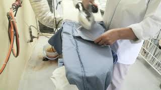 How to pressing a trousers using hand iron machine