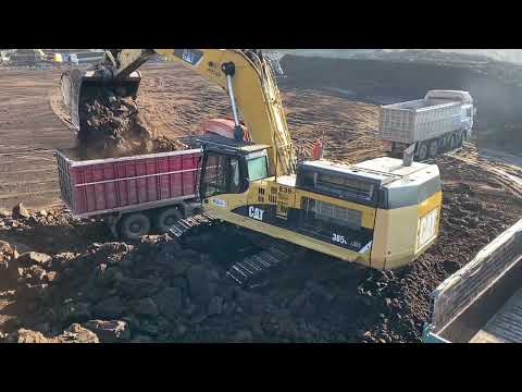 Caterpillar 365C Excavator Loading Mercedes & MAN Trucks - Interkat SA