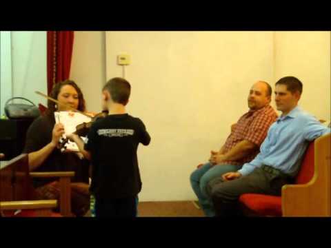 AJ playing the Fiddle