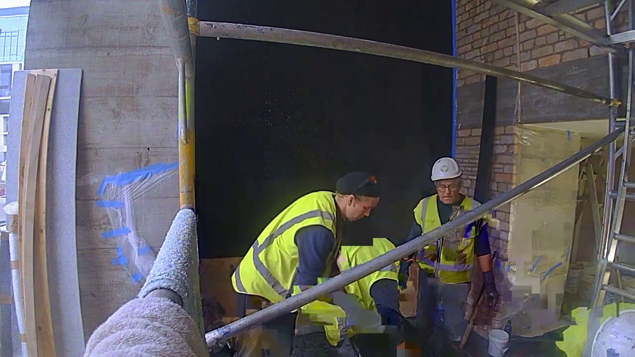 Applying black earth plaster