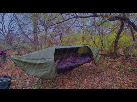 Camping in a RAIN STORM testing night cat lay flat hammock