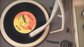 BUCK OWENS (2) 45 records Tiger by the tail and....