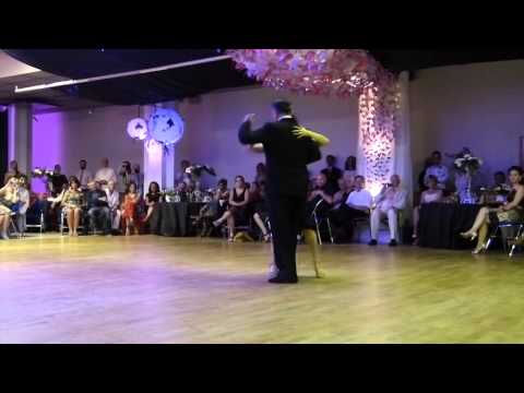  Jose Luis Gonzalez  and  Paulina Cazabon Goméz  are  dancing  to  a  milonga
