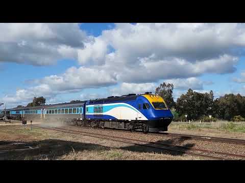 An XPT kicking up some dust at Shepherds (level crossing), NSW.