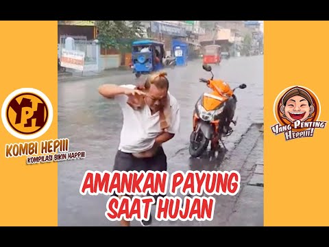 kombi-heppiii-selamatkan-payung-saat-hujan