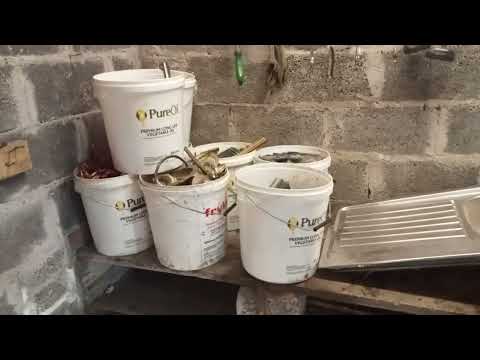 buckets of scrap copper and brass and bags of wire