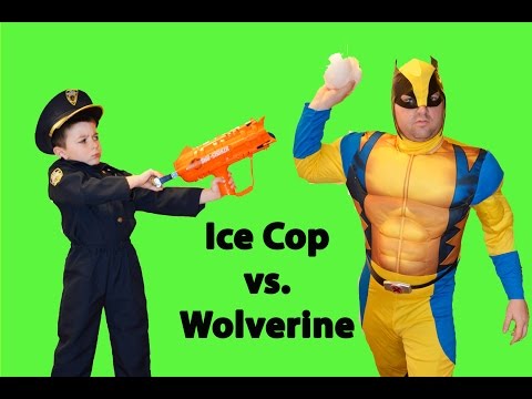 Little Heroes Officer Ryan and Wolverine Play in the Snow During Winter