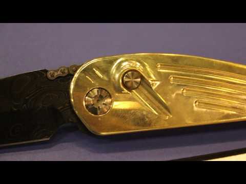 Ratworx X-FACTOR ambidextrous reversible button lock automatic, and the Chief custom knife.