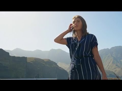 Woman Walking On Beach Stock Video