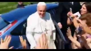Pope Francis Stops MotorcadeTo Bless Disabled Girl