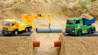 Rescue and play with crane truck construction vehicles - Toy car story