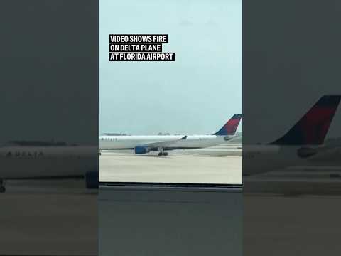 Video shows fire on Delta plane at Florida airport