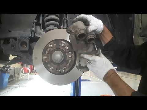 mitsubishi montero( replace front and rear brake pads