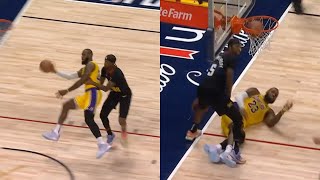 LeBron James somehow hits and-1 while being tackled to the ground by KCP 🤯