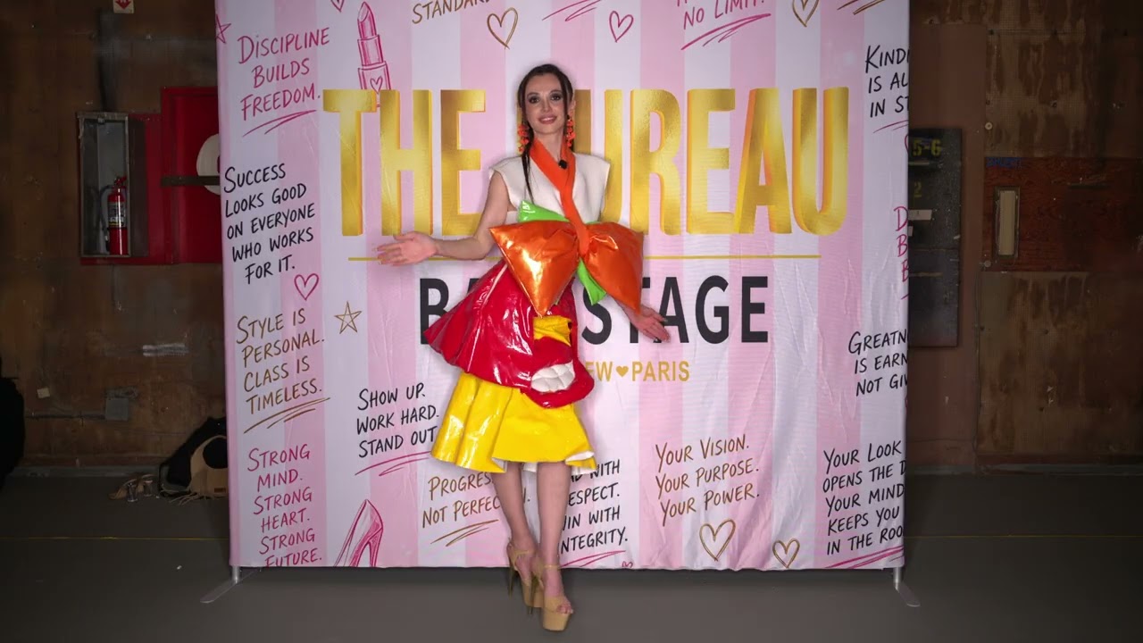 Model Huseyn Zade at Bureau Fashion Week poses wearing avant guard styled  piece