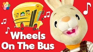 Wheels on the Bus Go Round Round  | Popular Nursery Rhymes with Harry The Bunny | BabyFirst TV