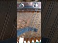 Broken coil piece vibrating up piano wire. lol