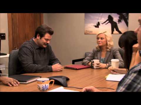Ron Swanson pulls his own tooth in a work meeting
