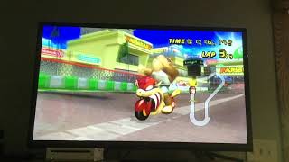 Beating all 4 expert staff ghosts in the Mushroom Cup in Mario Kart Wii!