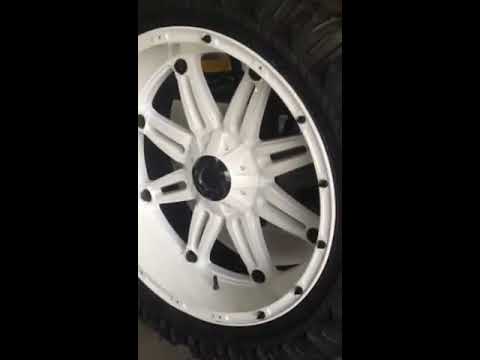 custom spikes on fuel hostage white 24" wheels by underground autostyling