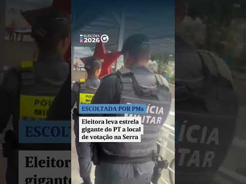 Eleitora leva estrela gigante do PT e é escoltada por PMs em local de votação
