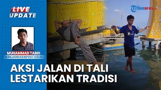 Tradisi Titi Tali Bajau Samah, Aksi Nelayan Kotabaru Jalan di Atas Seutas Tali Jadi Perhatian Warga