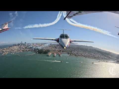 The Canadian Snowbirds fly over San Francisco